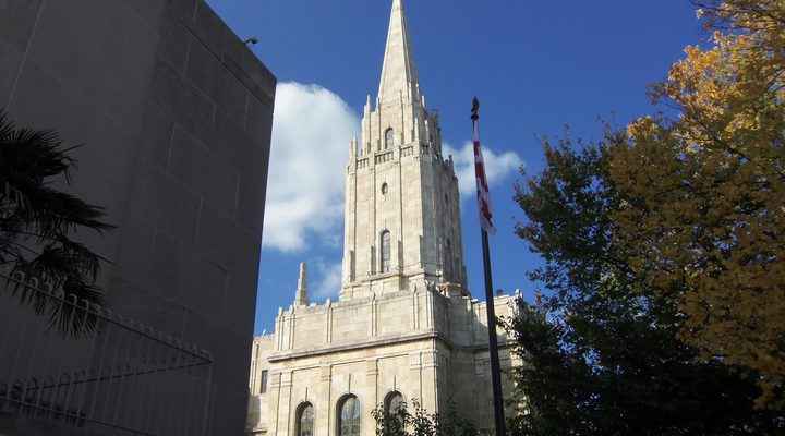 The Washington Chapel at 1610 Columbia Road NW in Washington, D.C., a grey stone church with a tall central tower modeled on the Salt Lake Temple.